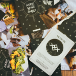 Cards and photos fatlay, card with Latvian traditional symbols