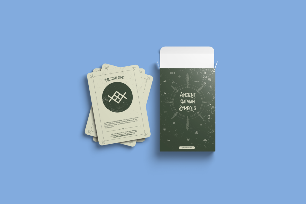 playing cards with Latvian traditional symbols on them. A card with text Laimas zīme and box with text Ancient Latvian Symbols