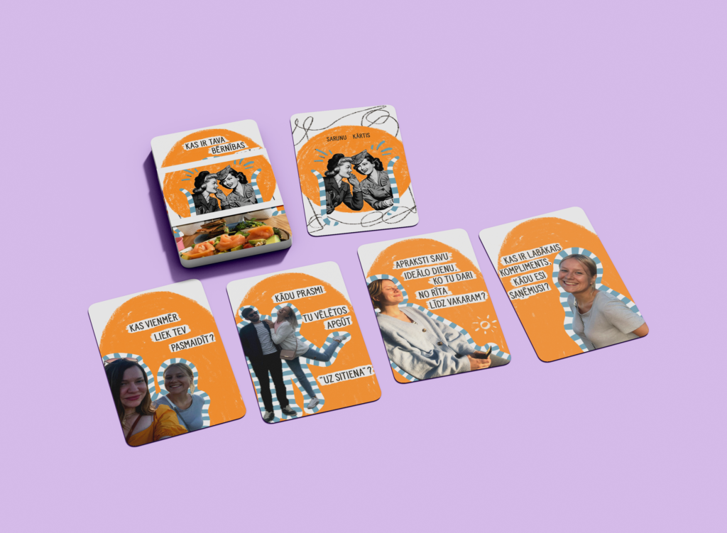 Custom made card deck with a different photo and text on each card. colorful cards on pink background